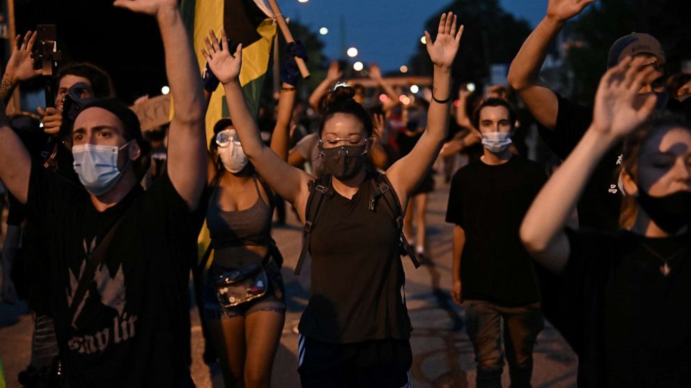 PHOTO: Demonstrators take part in a protest against the police shooting of Jacob Blake in Kenosha, Wisconsin, on Aug. 26, 2020.