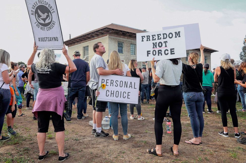 PHOTO: Anti-vaccine protesters stage a protest outside of the San Diego Unified School District office to protest a forced vaccination mandate for students on Sept. 28, 2021 in San Diego, Calif.