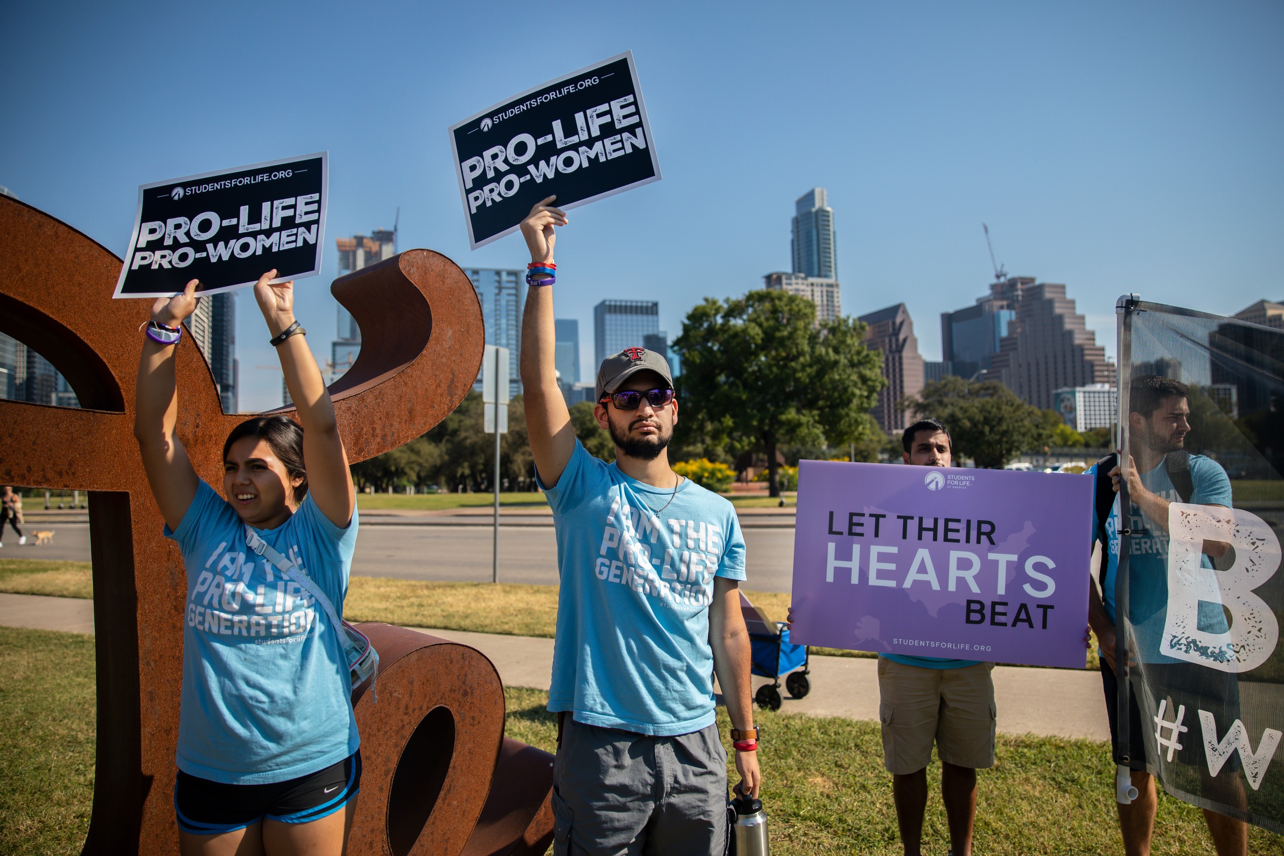 PHOTO: Anti-abortion rights demonstrators protest during a Women's March in Austin, Texas, Oct. 8, 2022.