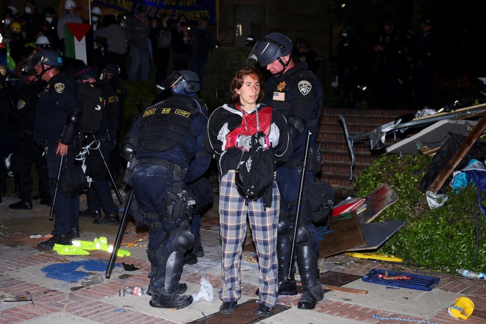 PHOTO: Law enforcement officers detain a protester at the University of California Los Angeles on May 2, 2024.