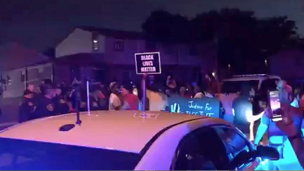 PHOTO: In this still image taken from a video, protesters gather near the site of an officer-involved shooting in Kenosha, Wisconsin, on Aug. 23, 2020.