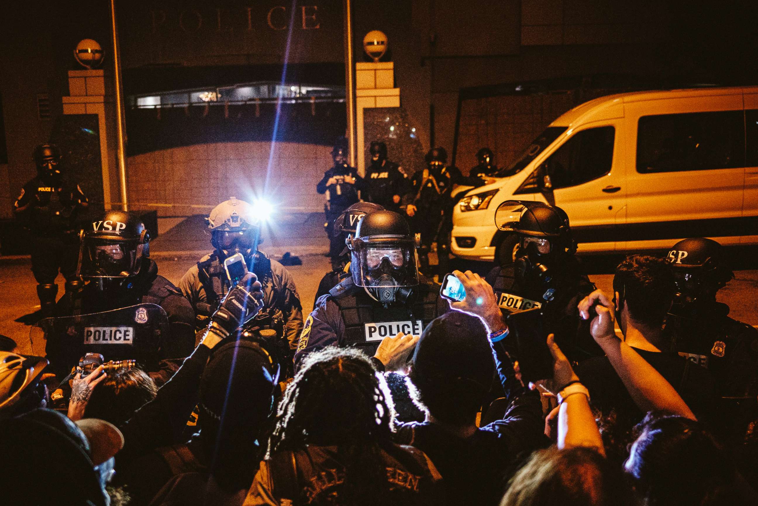 PHOTO: Protesters surround the police head quarters, calling for an end to police brutality and racial injustice, in Richmond, Virginia, on June 14, 2020.