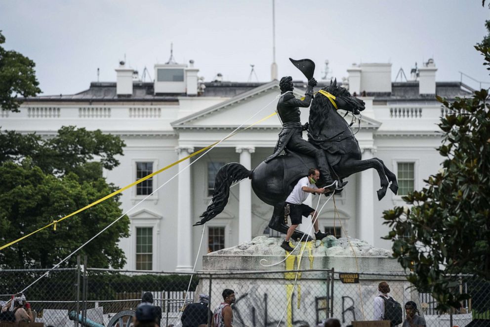 PHOTO: Protesters attempt to pull down the statue of former U.S. President Andrew Jackson in Lafayette Square near the White House in Washington, D.C., on June 22, 2020.