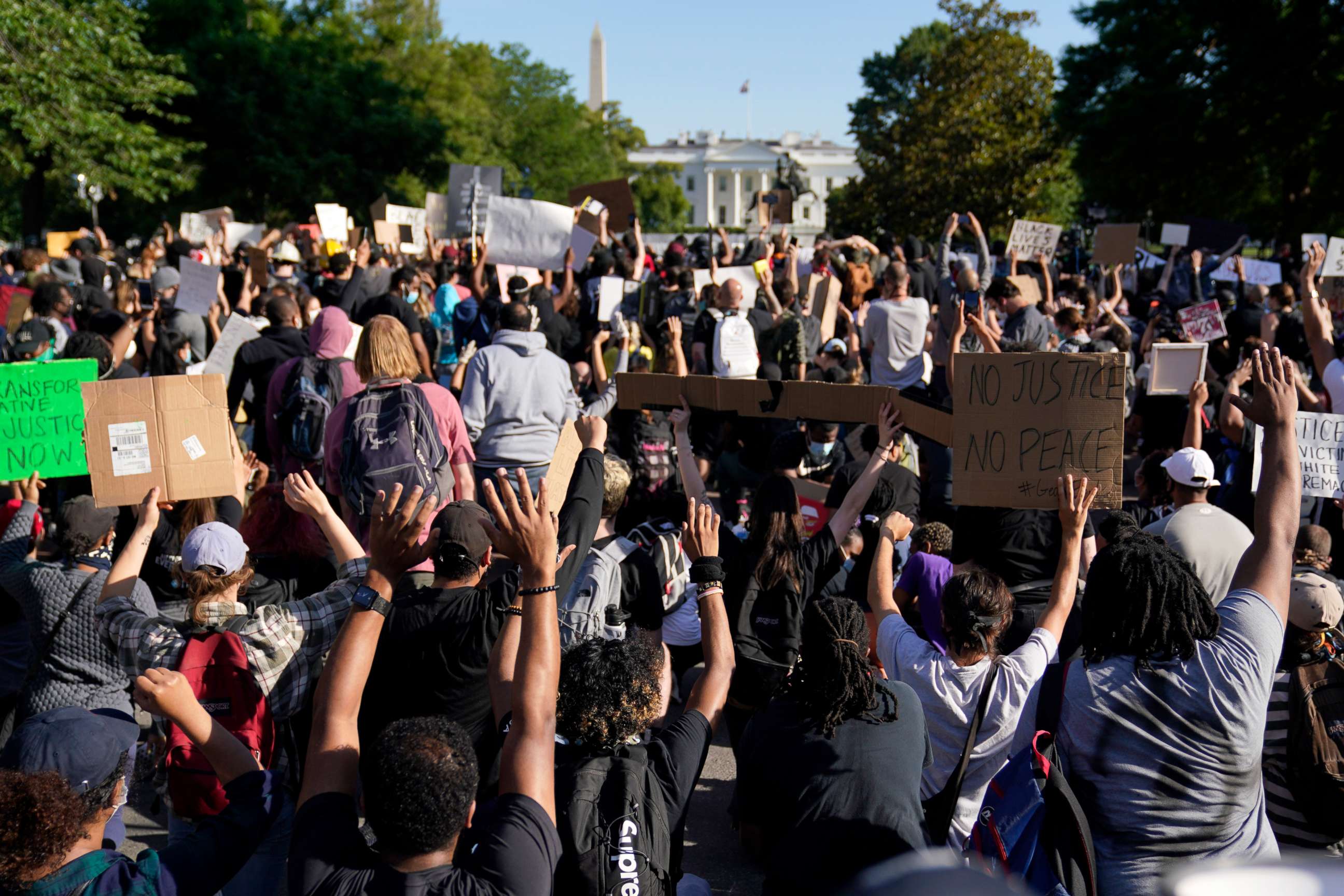 PHOTO: Demonstrators gather to protest the death of George Floyd, Monday, June 1, 2020, near the White House in Washington.