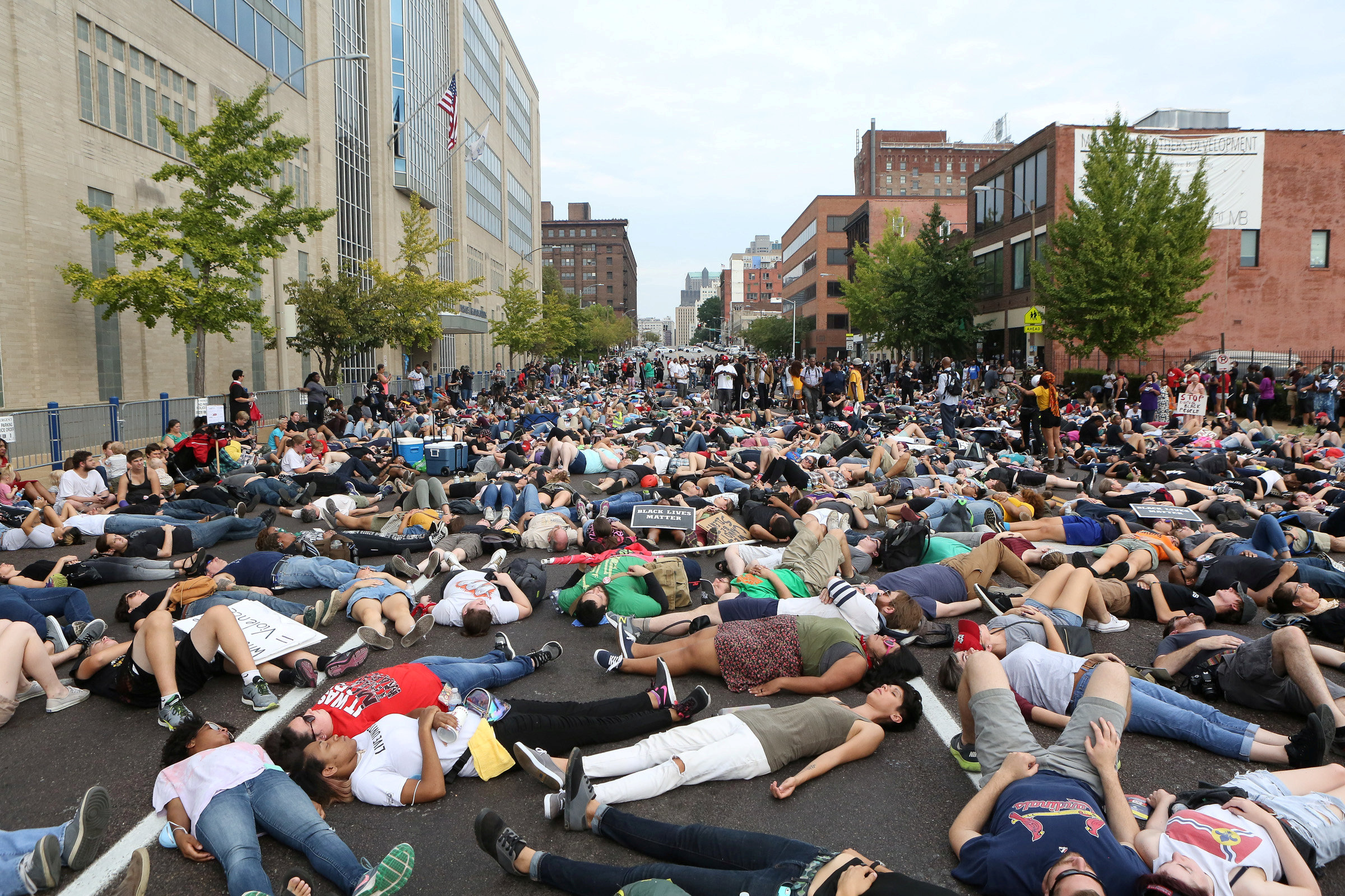 PHOTO: Protesters stage a "die-in" during a rally outside the police headquarters in St. Louis, Sept. 17, 2017.  