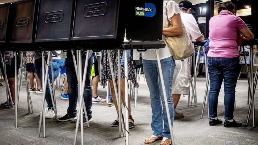 PHOTO: Florida residents vote on the first day of early voting in Miami, Oct. 19, 2020.