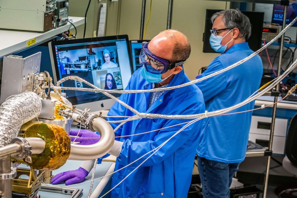 PHOTO: Engineers work on the Gamma Ray/Neutron Spectrometer that will launch aboard the Psyche spacedraft to detect, measure and map the asteroid Psyche's elemental composition, at the Johns Hopkins Applied Physics Lab in Laurel, Md., July 7, 2020.