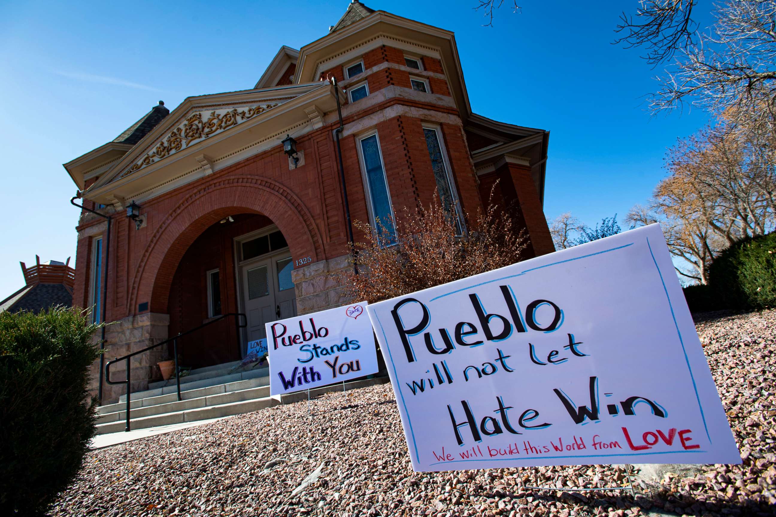 PHOTO: Signs, flowers and candles expressing love for the Jewish community stand outside the Temple Emanuel in Pueblo, Colo., Nov. 5, 2019.