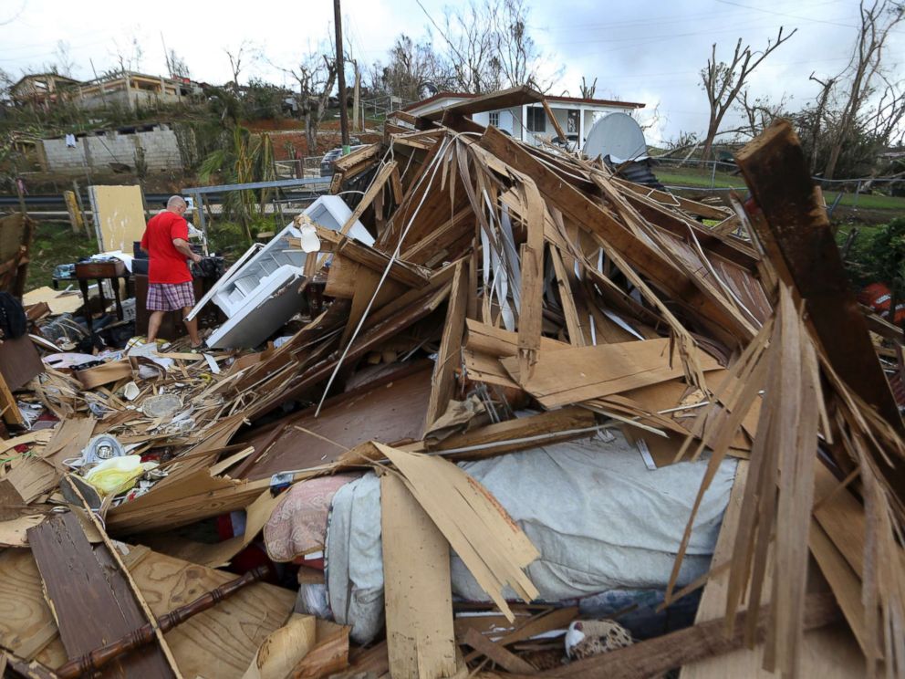 PHOTO: Jose Garcia Vicente walks through rubble of his destroyed home, in the aftermath of Hurricane Maria, in Aibonito, Puerto Rico, Sept. 25, 2017.