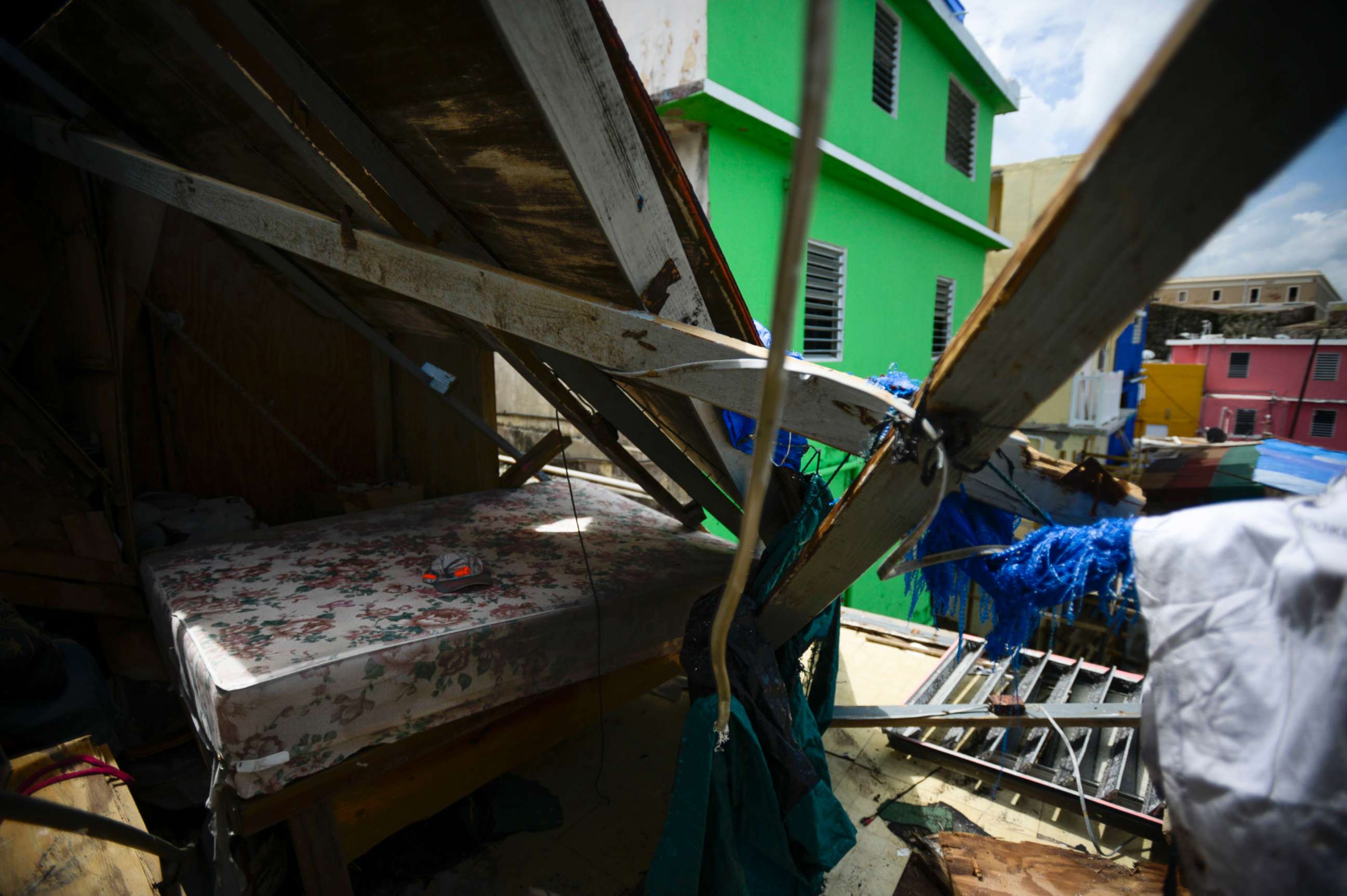 PHOTO: A bed surrounded by debris after Hurricane Maria, in San Juan, Puerto Rico, Sept. 25, 2017. 