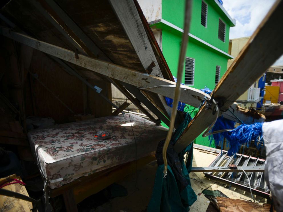 PHOTO: A bed surrounded by debris after Hurricane Maria, in San Juan, Puerto Rico, Sept. 25, 2017.