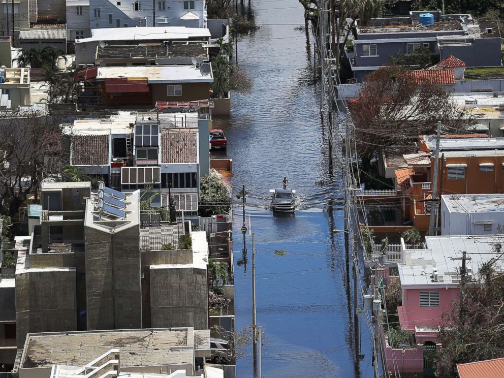 PHOTO: A flooded street is seen as people deal with the aftermath of Hurricane Maria on Sept. 25, 2017 in San Juan, Puerto Rico.
