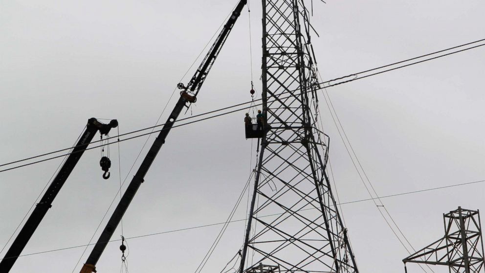 PHOTO: Workers restore high tension power lines damaged by Hurricane Maria in Guayama, Puerto Rico on Oct. 28, 2017.