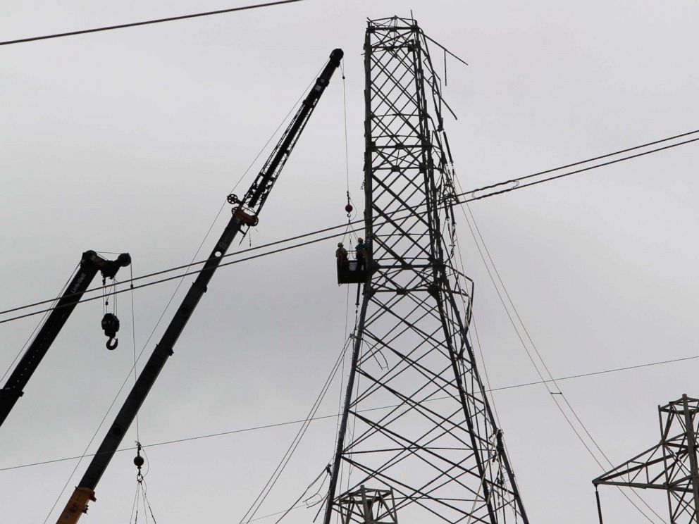 PHOTO: Workers restore high tension power lines damaged by Hurricane Maria in Guayama, Puerto Rico on Oct. 28, 2017.