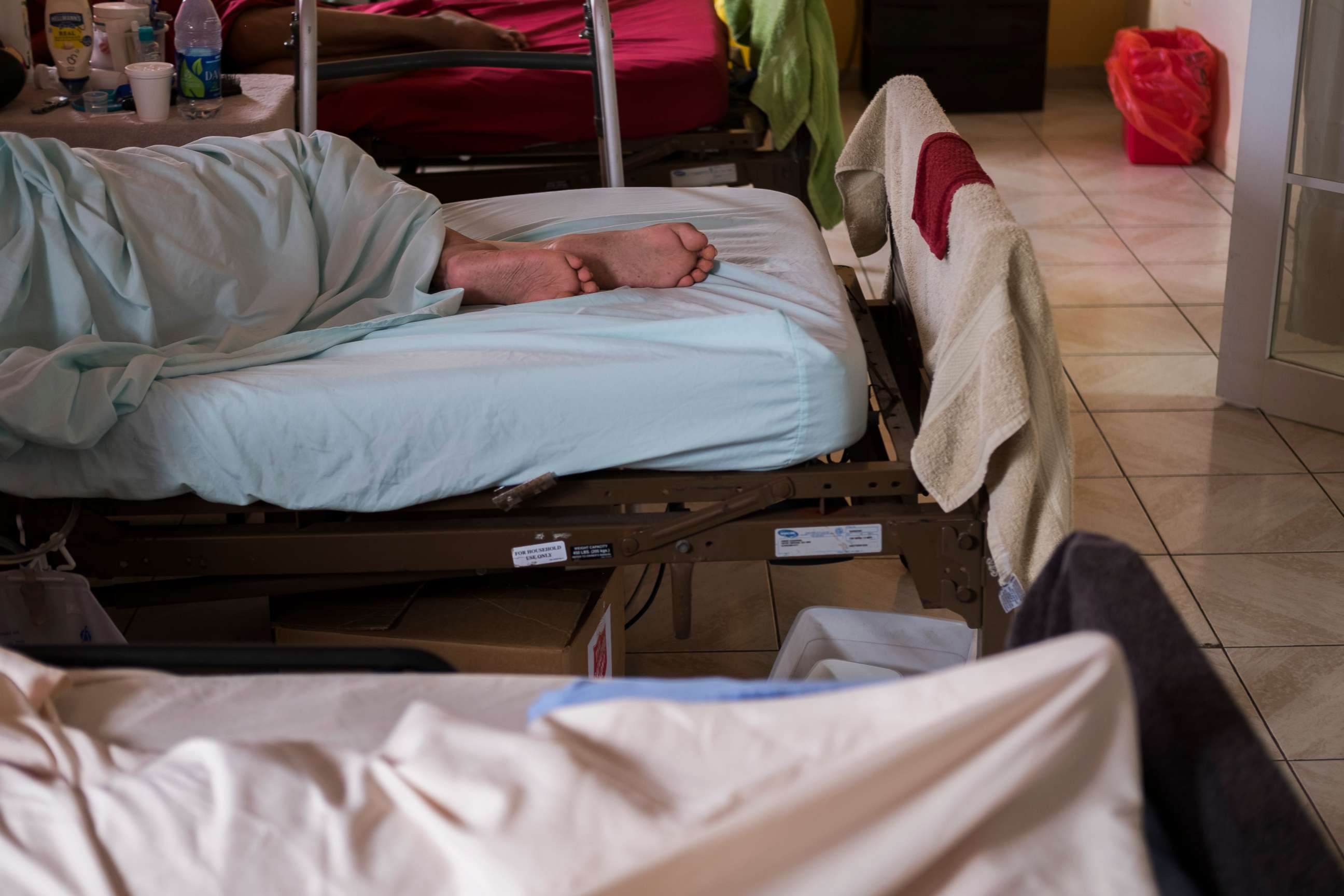 PHOTO: Patients lie in beds at a non profit HIV clinic in Toa Baja, Puerto Rico, March 20, 2019.