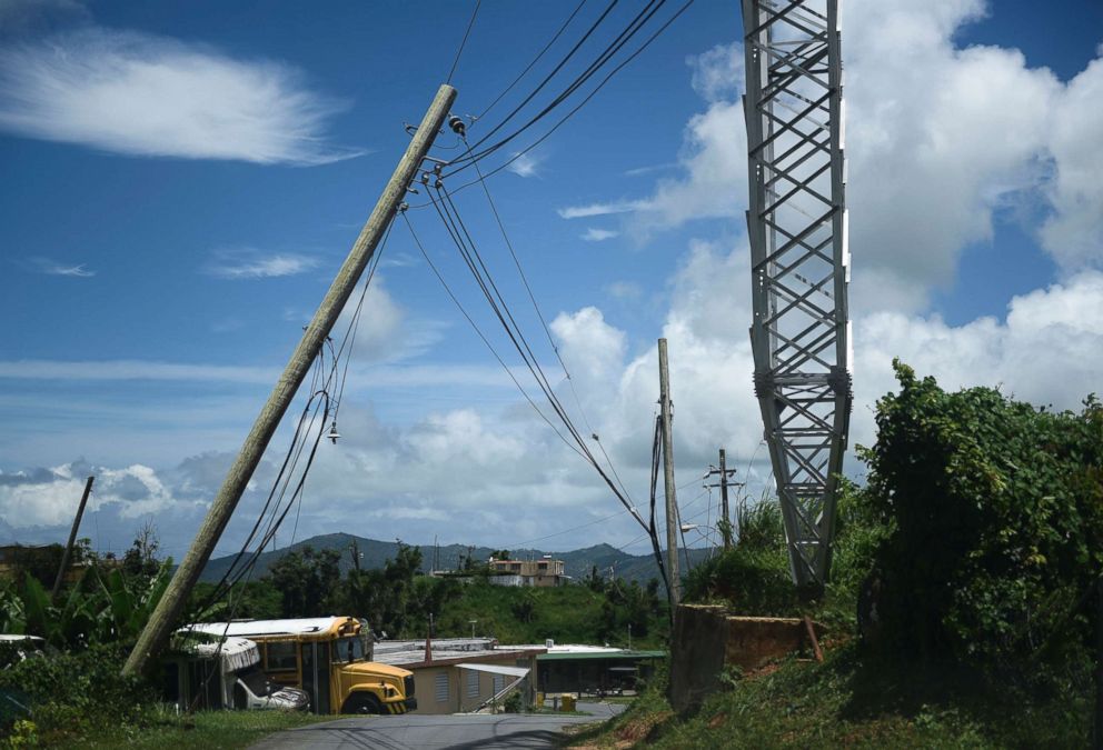 PHOTO: An electric power pole leans over the road in the Piedra Blanca area of Yabucoa, Puerto Rico, May 16, 2018.