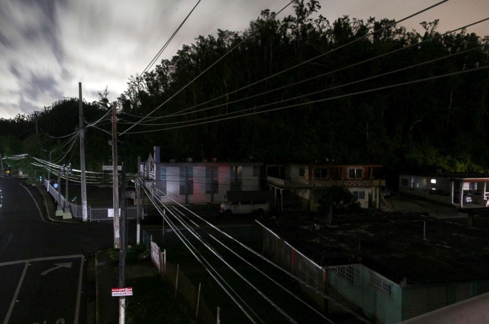 PHOTO: Houses are seen in the dark in a neighbourhood without electricity after the electrical grid was damaged by Hurricane Maria in September, in Dorado, Puerto Rico, Jan. 22, 2018.