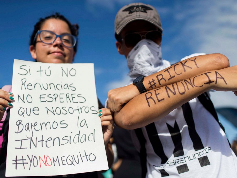 PHOTO: Demonstrators pose for a photo during march on Las Americas highway demanding the resignation of governor Ricardo Rossello, in San Juan, Puerto Rico, Monday, July 22, 2019.