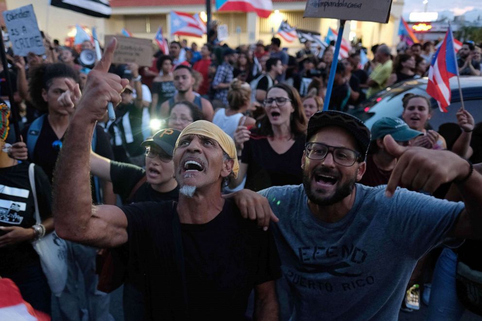 PHOTO: People march in protest against Puerto Rico's current Secretary of Justice Wanda Vazquez, next in line for Puerto Rico's governor, in San Juan, Puerto Rico, July 29, 2019.