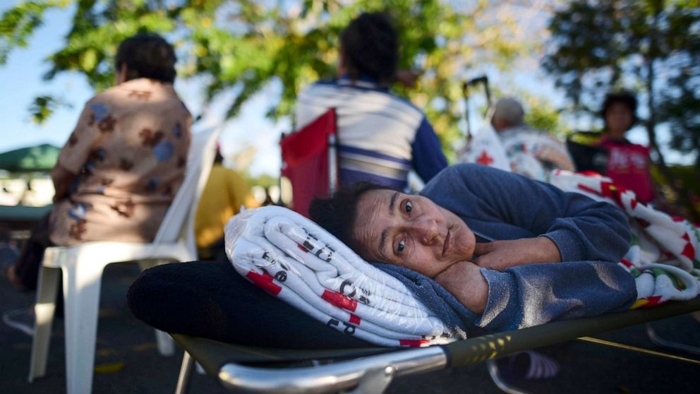 PHOTO: Maribel Rivera Silva, 58-years-old, rests outside a shelter due to concerns over aftershocks following an earthquake in Guanica, Puerto Rico, Jan. 7, 2020. 