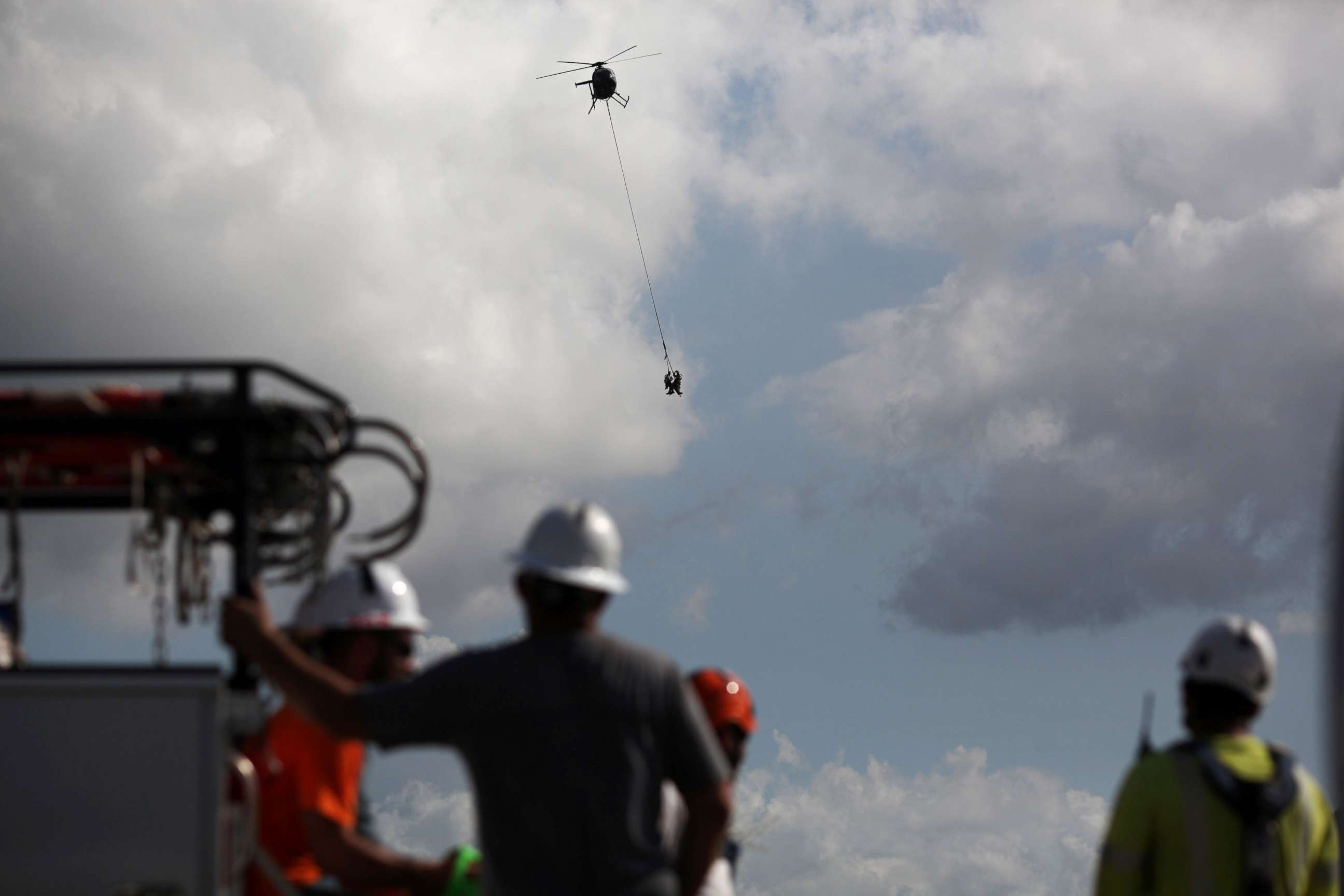 PHOTO: Workers from Montana-based Whitefish Energy Holdings help fix the island's power grid, damaged during Hurricane Maria in September, in Manati, Puerto Rico, Oct. 25, 2017.