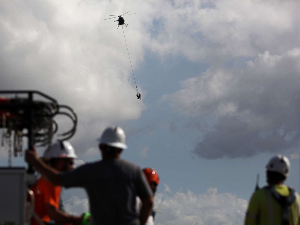 PHOTO: Workers from Montana-based Whitefish Energy Holdings help fix the islands power grid, damaged during Hurricane Maria in September, in Manati, Puerto Rico, Oct. 25, 2017.