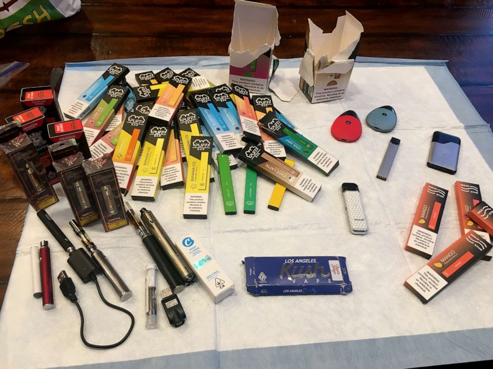 PHOTO: This photo provided by Stanford University tobacco researcher Bonnie Halpern-Felsher, Feb. 3, 2020, shows e-cigarette products confiscated from high school students, including disposable e-cigarettes called Puff Bars.