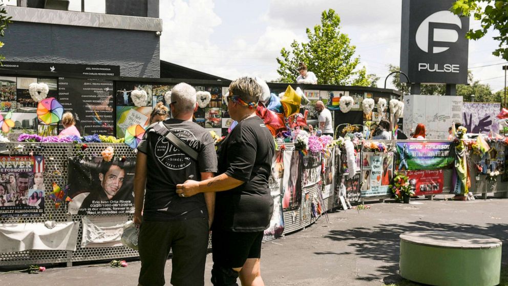 PHOTO: Survivors and their supporters gather at Pulse in downtown Orlando on the fifth anniversary of the mass shooting that took 49 lives, June 12, 2021.