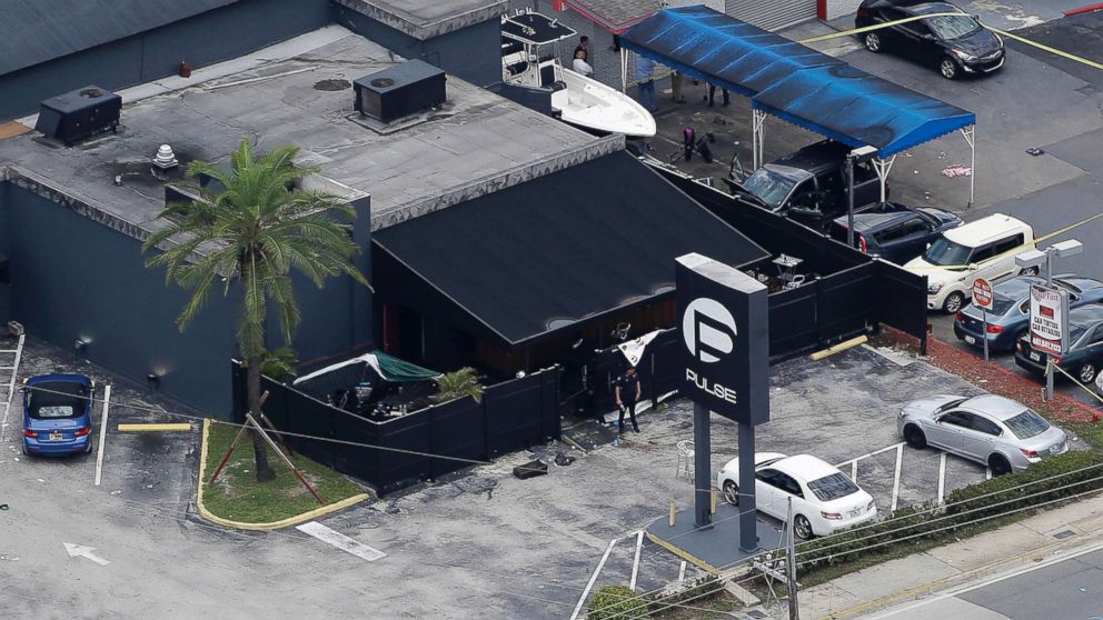PHOTO: Law enforcement officials work at the Pulse gay nightclub in Orlando, Fla., following a mass shooting, June 12, 2016.  