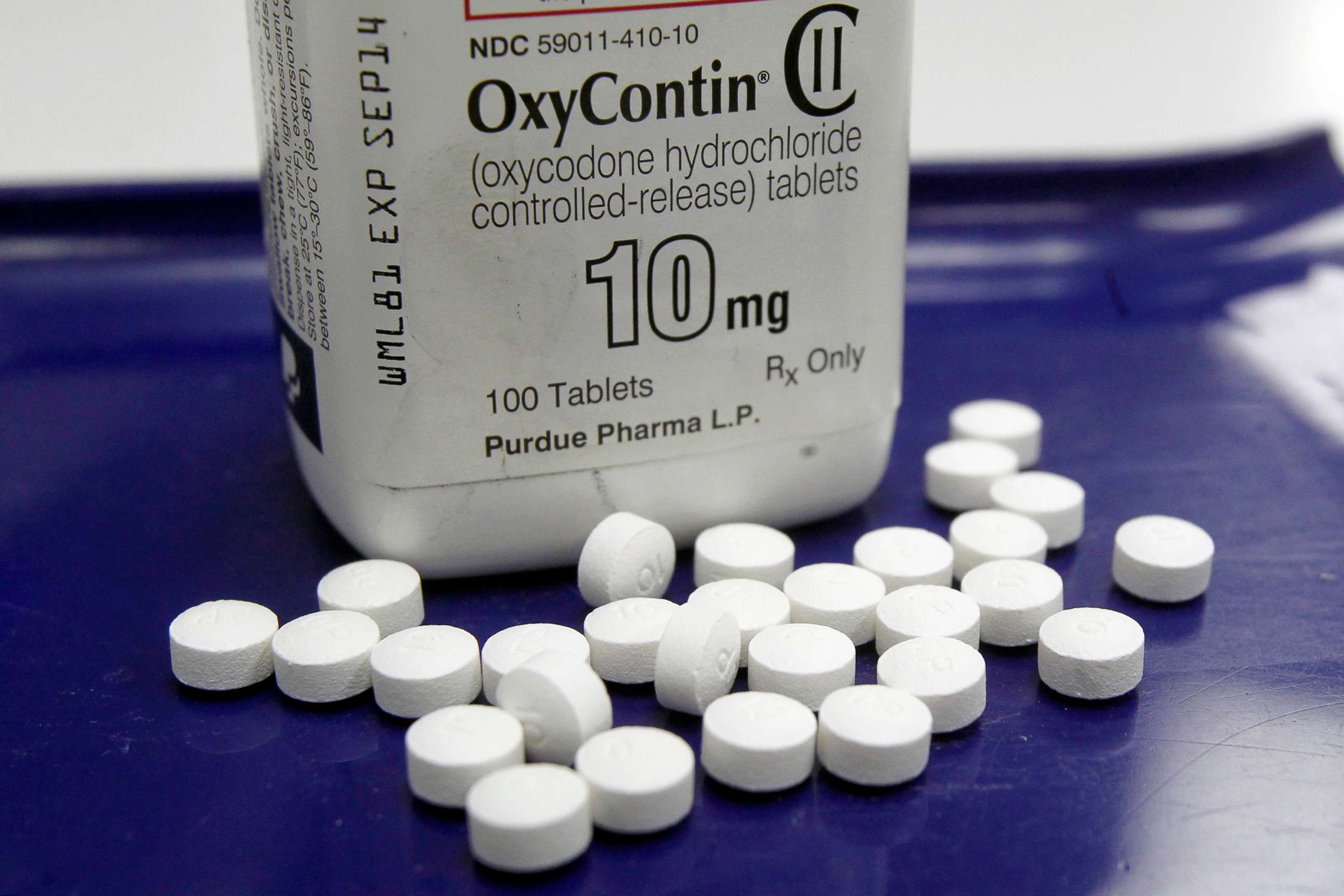 PHOTO: OxyContin pills and a bottle are arranged for a photo at a pharmacy in Montpelier, Vt., Feb. 19, 2013.