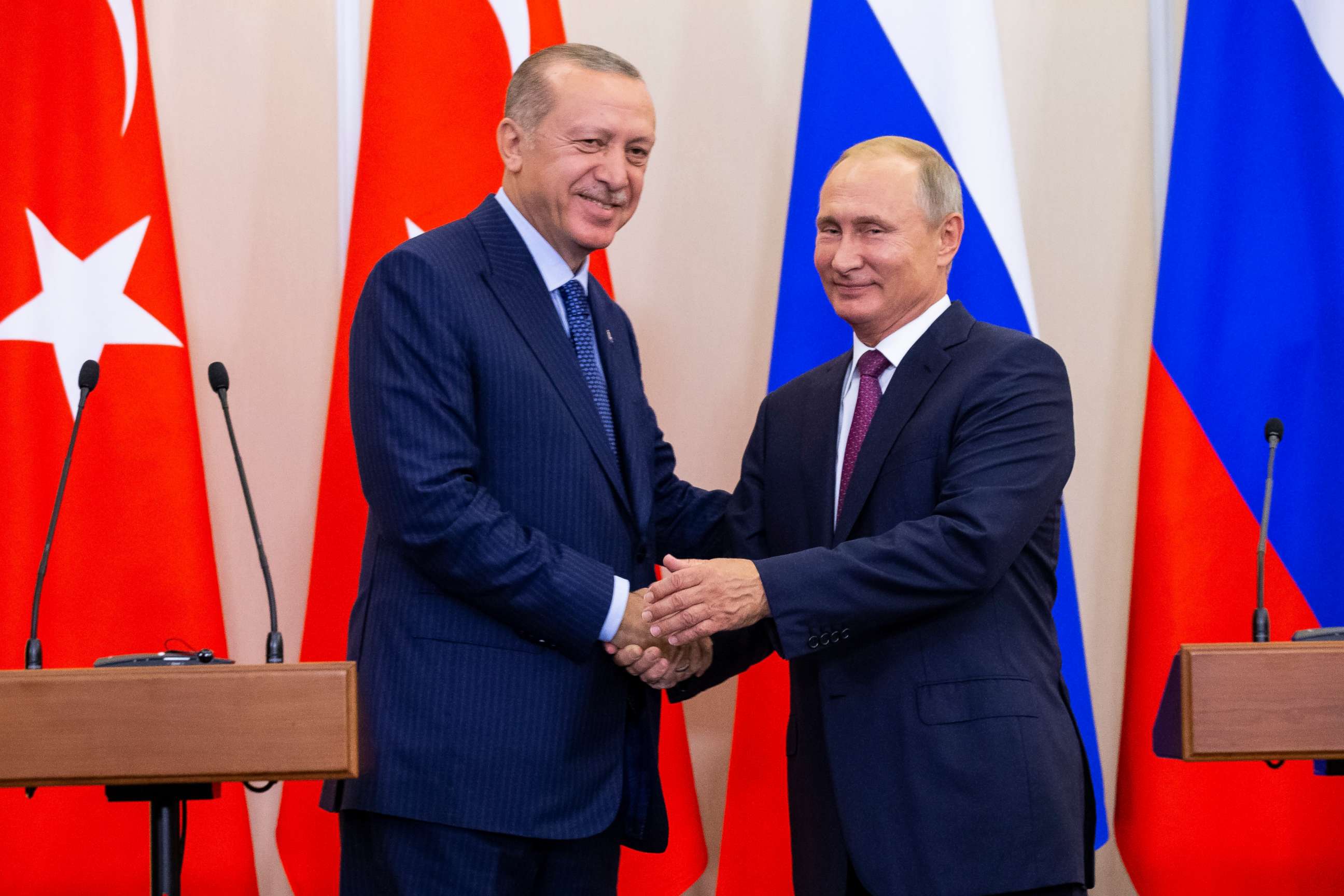 PHOTO: Russian President Vladimir Putin and Turkish President Recep Tayyip Erdogan shake hands after their joint news conference in Sochi, Russia, Sept. 17, 2018.