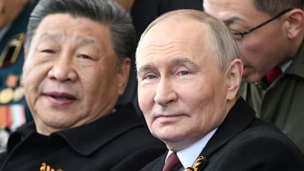Russian President Vladimir Putin and his Chinese counterpart Xi Jinping attend a military parade on Victory Day, marking the 80th anniversary of the victory over Nazi Germany in World War Two, in Red Square in Moscow, May 9, 2025. 