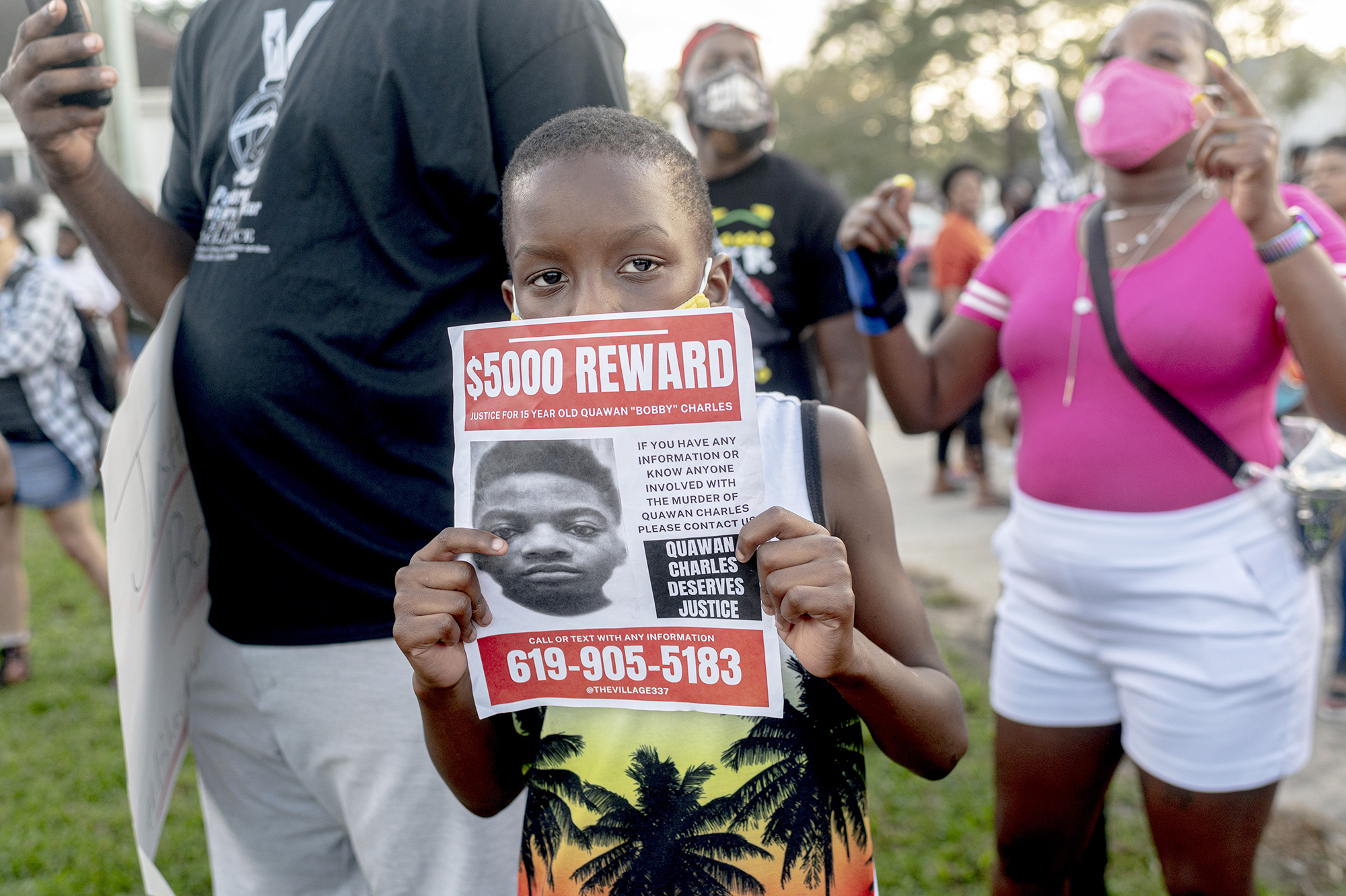 PHOTO: Protesters listen to speeches at city hall during the march for justice for 15 year old Quawan Charles who disappeared and was found dead near Loreauville, La., Nov. 14, 2020.
