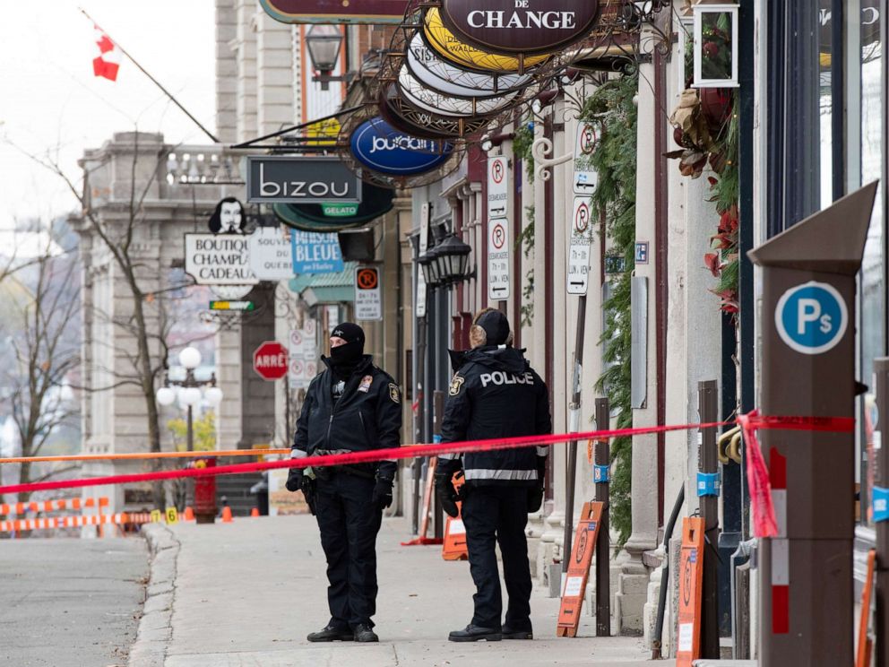 PHOTO: Polices officers guard the site of a multiple stabbing in the historical quarter of Quebec City, Nov. 1, 2020.
