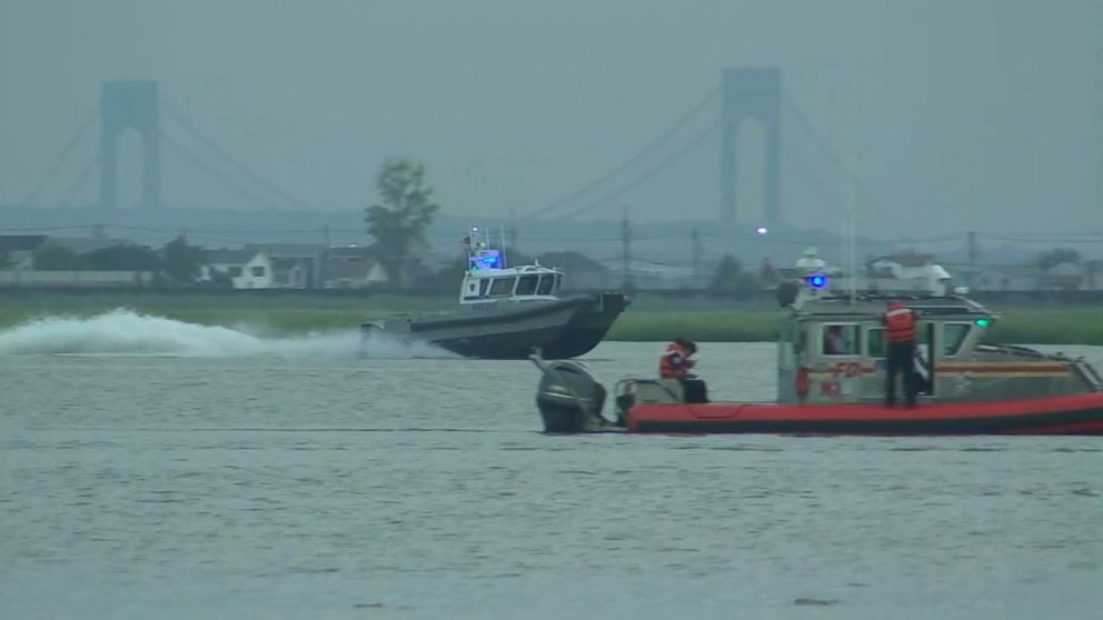 PHOTO: Police and rescue teams resume their search to find a 35-year-old woman who was swept away by a wave in Breezy Point Queens this Aug. 12, 2018. 
