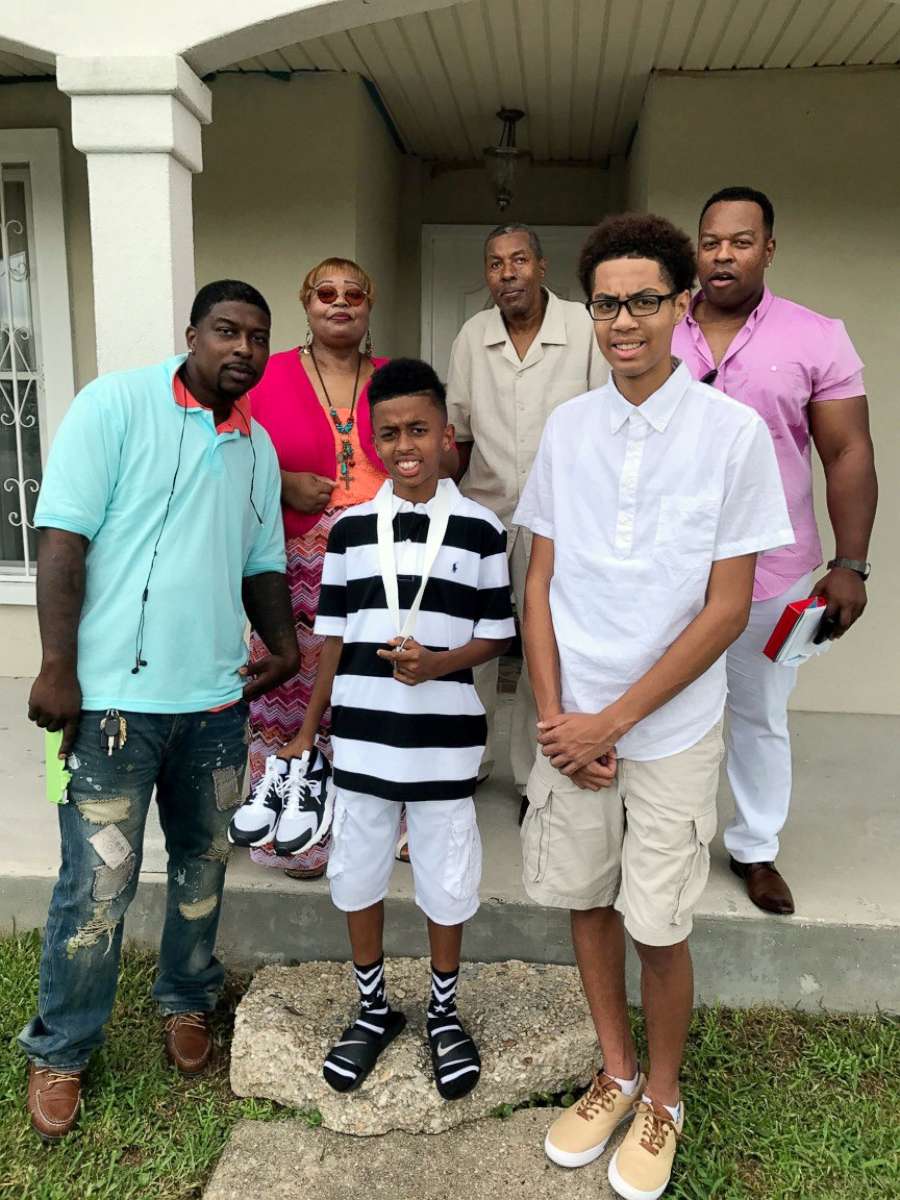 PHOTO: Quinnyon Wimberly, mother Irene Wimberly, son Quinnyon Wimberly II, father Frank Wimberly Sr., nephew Jordan Wimberly and brother Frank Wimberly Jr. pose for a family photo.