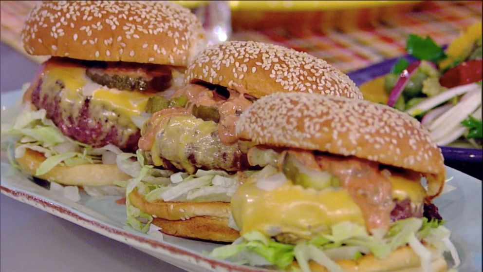 PHOTO: Rachael Ray brings "The View" co-hosts Fried Onion Smack Burgers from her book "Rachael Ray 50" on Tuesday, Oct. 15, 2019.
