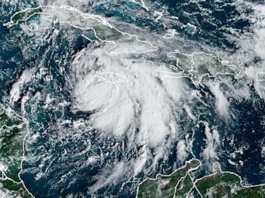 Tropical Storm Rafael slams Caribbean, may head to Gulf Coast this weekend