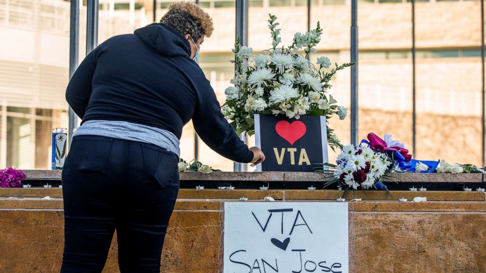 PHOTO: HERO Tent President Kiana Simmons tends to a vigil organized by her group following the mass shooting at the Valley Transportation Authority (VTA) light-rail yard, outside City Hall, May 26, 2021, in San Jose, Calif.