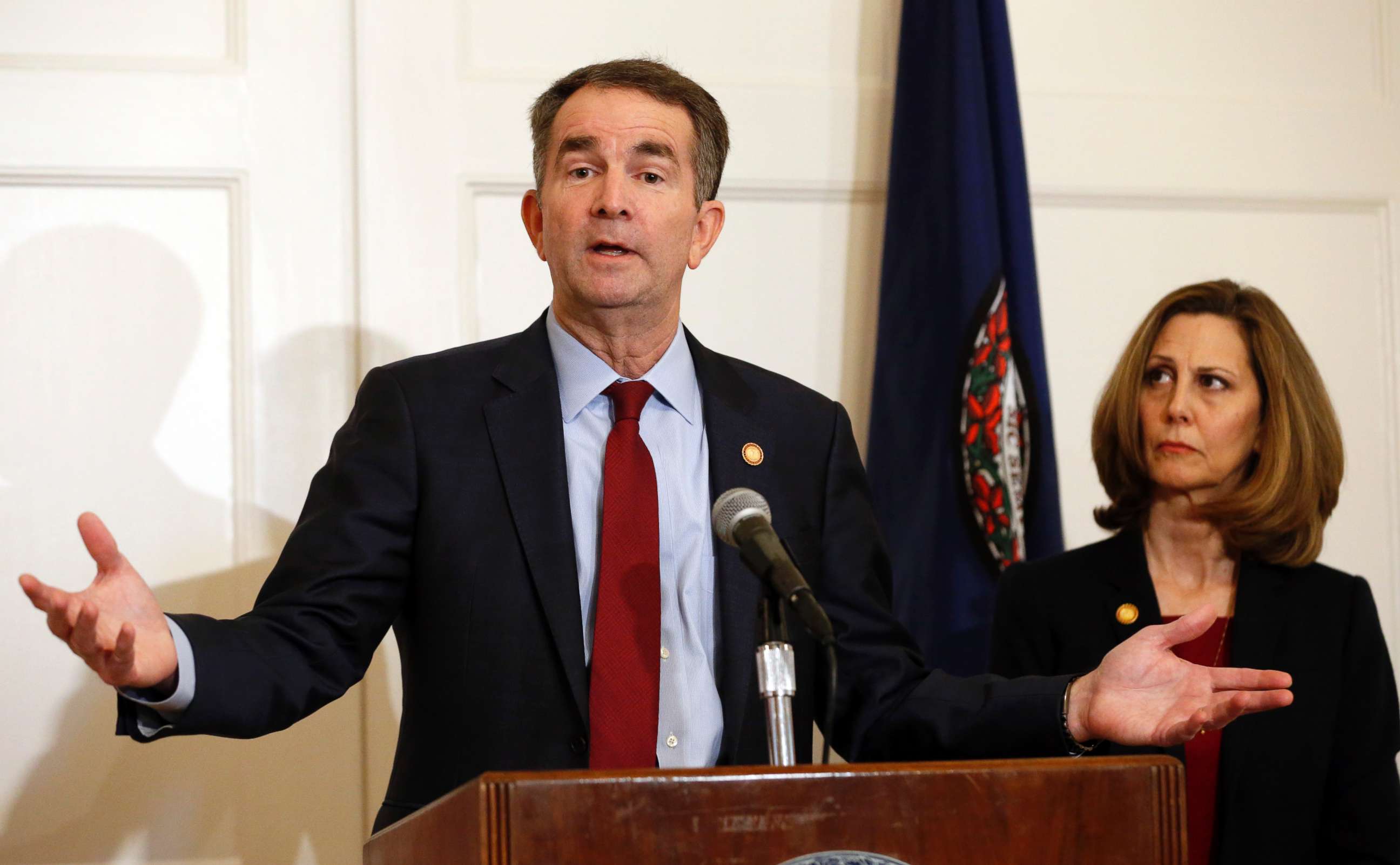 PHOTO: Virginia Gov. Ralph Northam, left, accompanied by his wife, Pam, speaks during a news conference in the governor's mansion in Richmond, Va.