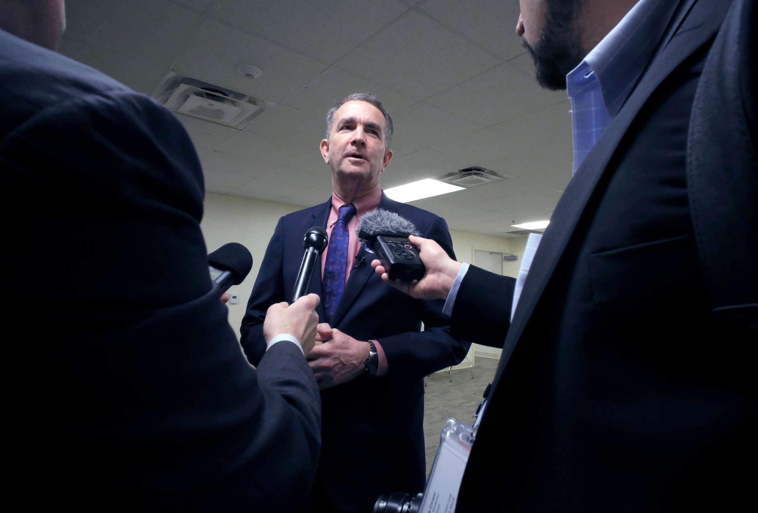 PHOTO: Virginia Governor Ralph Northam speaks with members of the media after a meeting inside the Pocahontas Building in Richmond, Va., March 3, 2020.