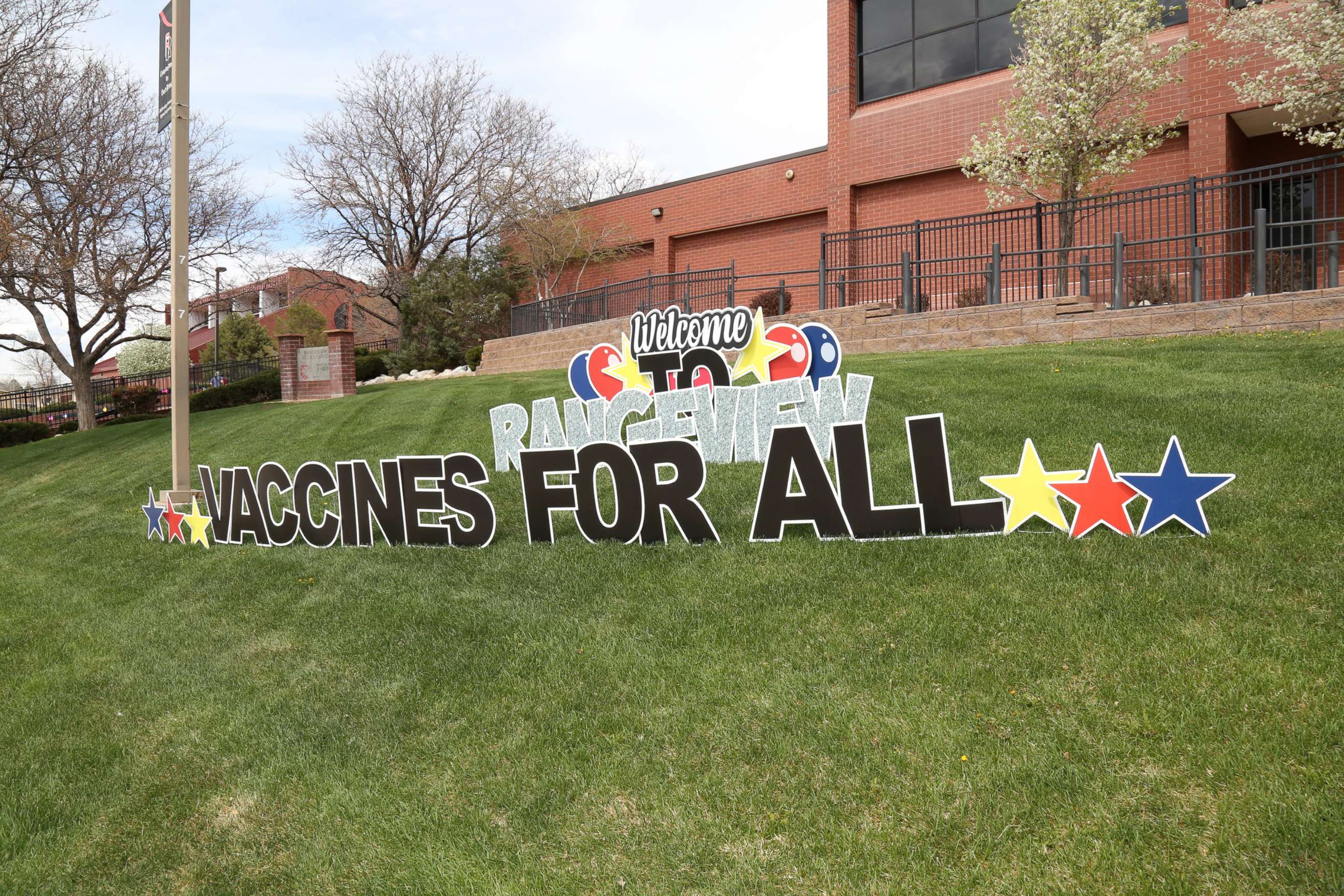 PHOTO: A view of the Rangeview High School vaccine clinic held on May 1, 2021, in Aurora, Colorado where Gov. Jared Polis spoke with patients getting shots.