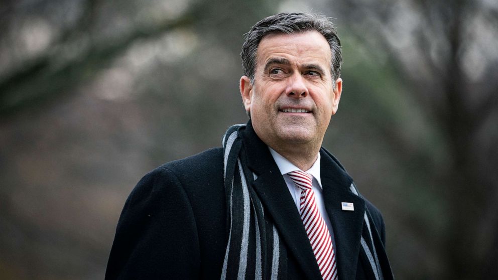 PHOTO: Director of National Intelligence John Ratcliffe follows behind on the South Lawn of the White House, Dec. 12, 2020, while serving under President Donald Trump.