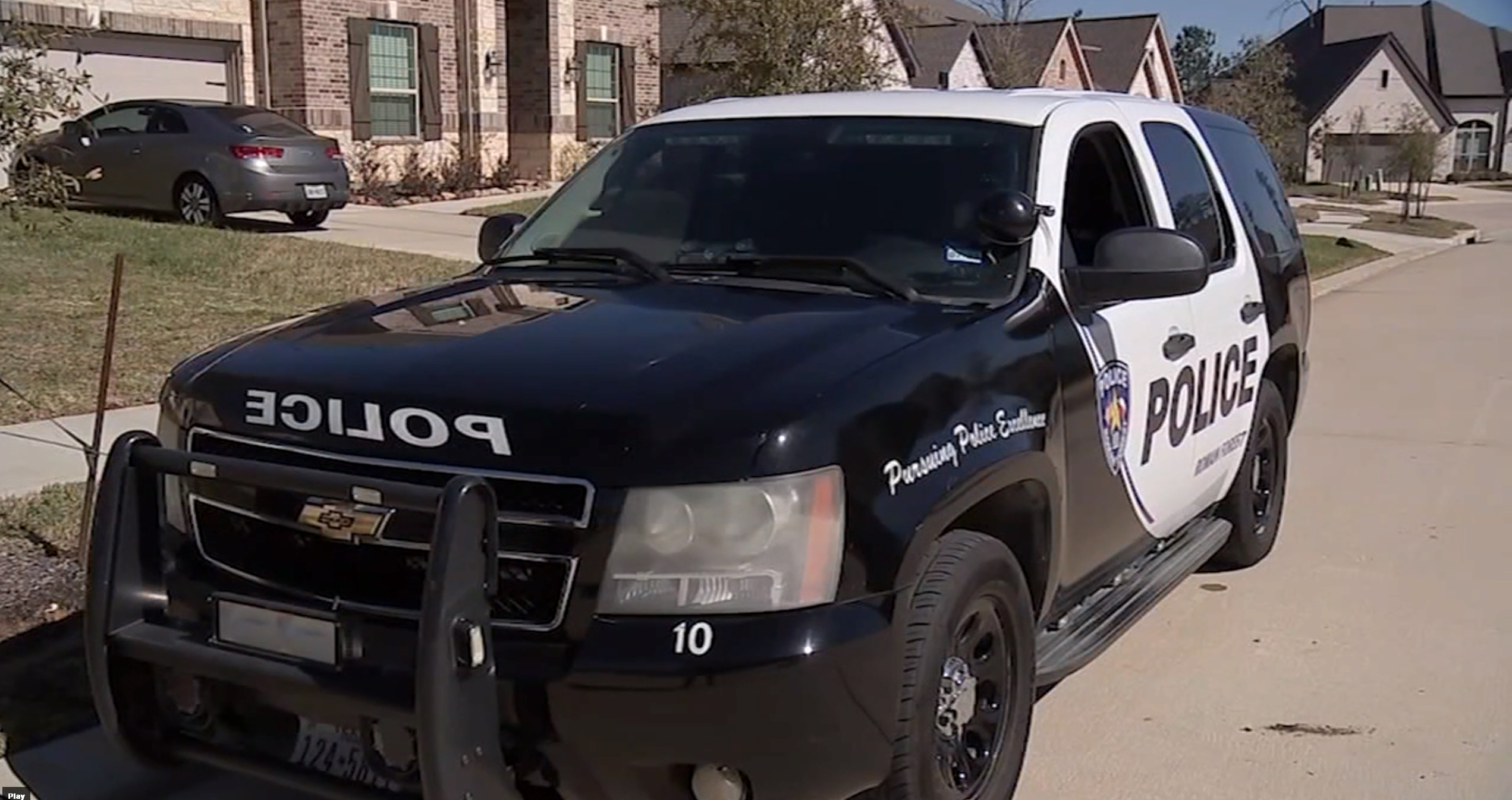 PHOTO: In this screen grab from a video, a police car sits near the home of Raven Yates in Roman Forest, Texas.