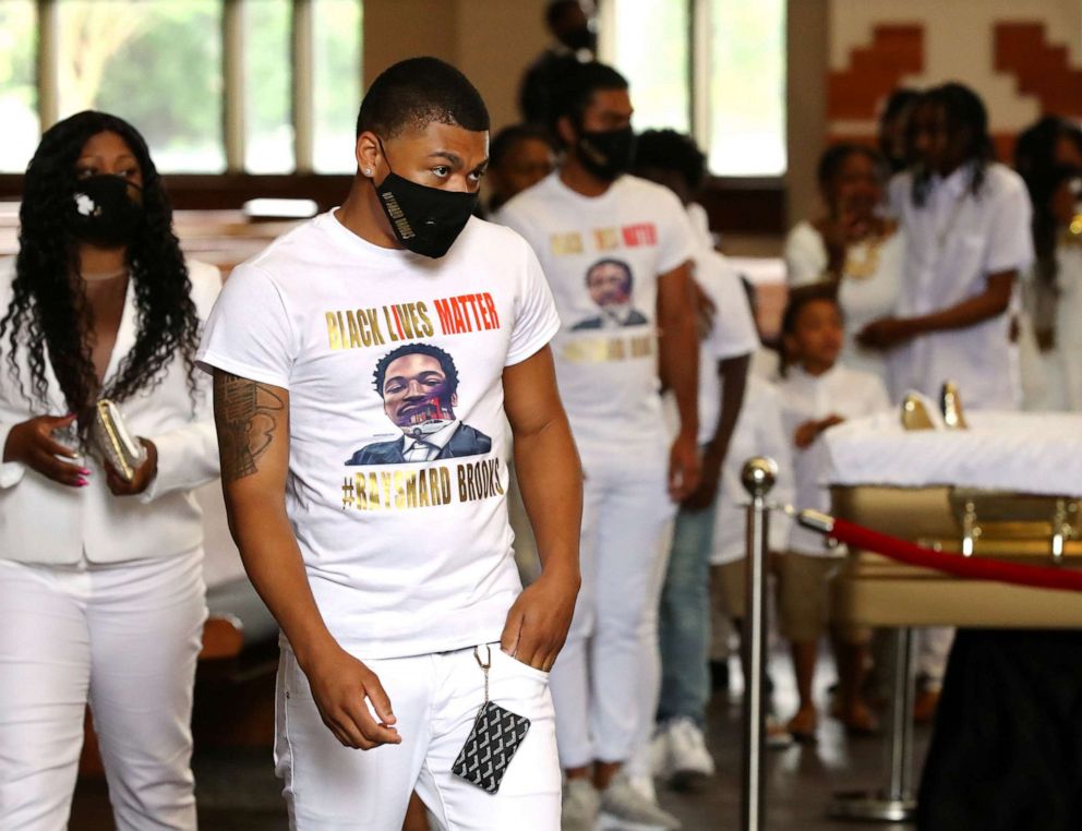 PHOTO: Family members and friends of Rayshard Brooks, who was shot dead June 12 by an Atlanta police officer, attend his funeral at Ebenezer Baptist Church in Atlanta, June 23, 2020.
