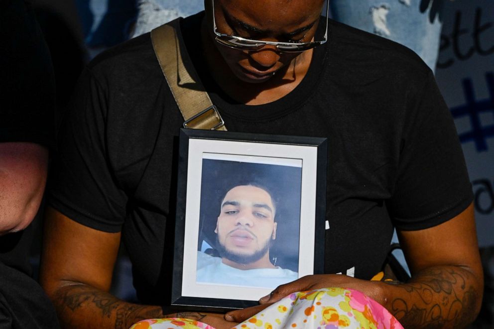 PHOTO: A photo of Donovan Lewis is displayed during a rally at Columbus Police Division Headquarters in Columbus, Ohio, September 2, 2022.