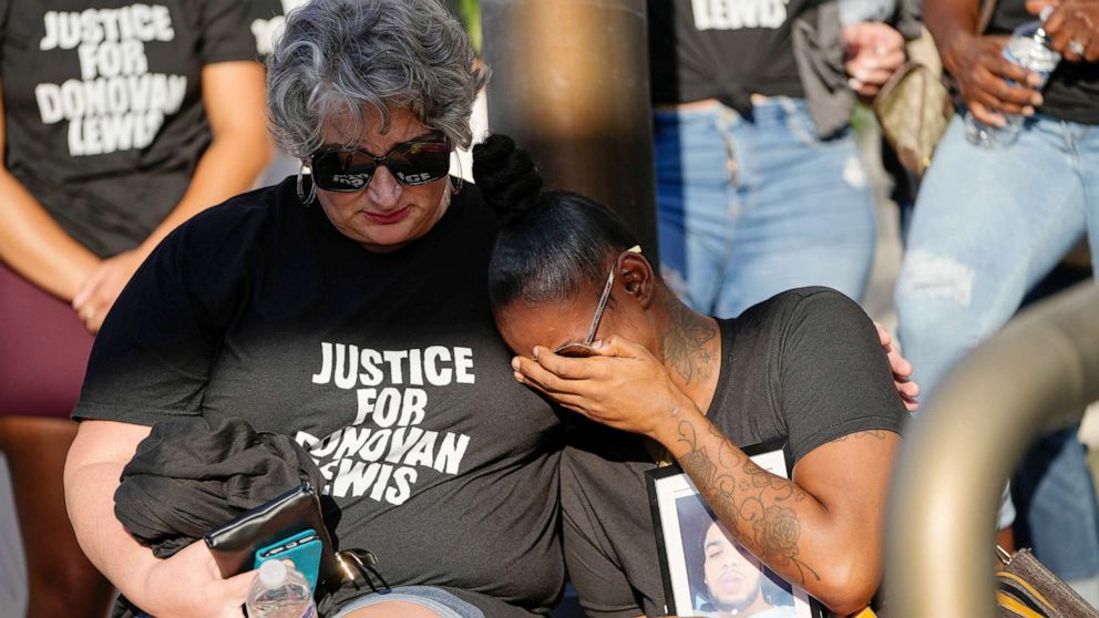 PHOTO: Rebecca Duran, mother of Donovan Lewis sits with protesters outside Division of Police headquarters in Columbus, Ohio, Sept. 2, 2022.