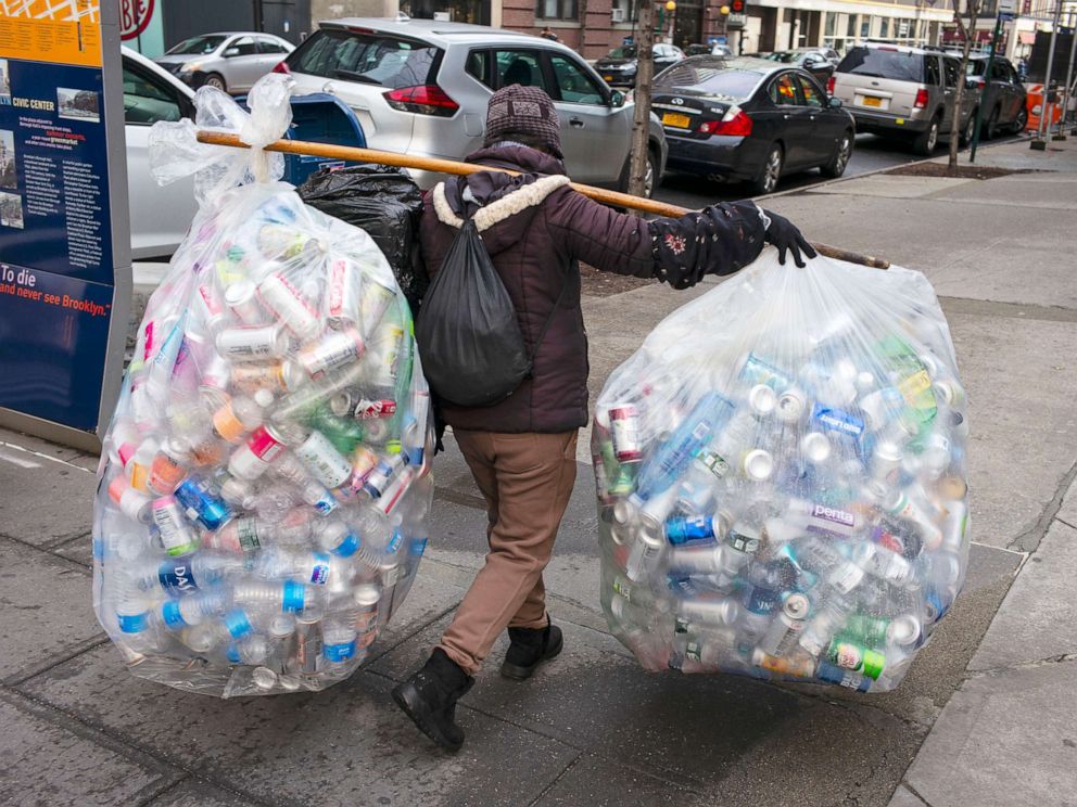 PHOTO: Recyclable cans and plastic bottles are carried to a redemption center in Brooklyn, New York, Feb. 2, 2020.