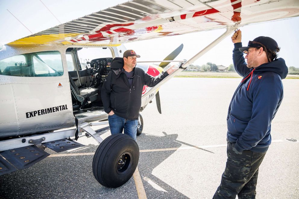 PHOTO: Pilots Luke Aikins and Andy Farrington discuss their training for Plane Swap in San Louis Obispo, Calif., April 5, 2022.