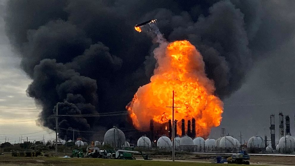 PHOTO: A process tower flies through air after exploding at the TPC Group Petrochemical Plant, after an earlier massive explosion sparked a blaze at the plant in Port Neches, Texas, Nov. 27, 2019.  